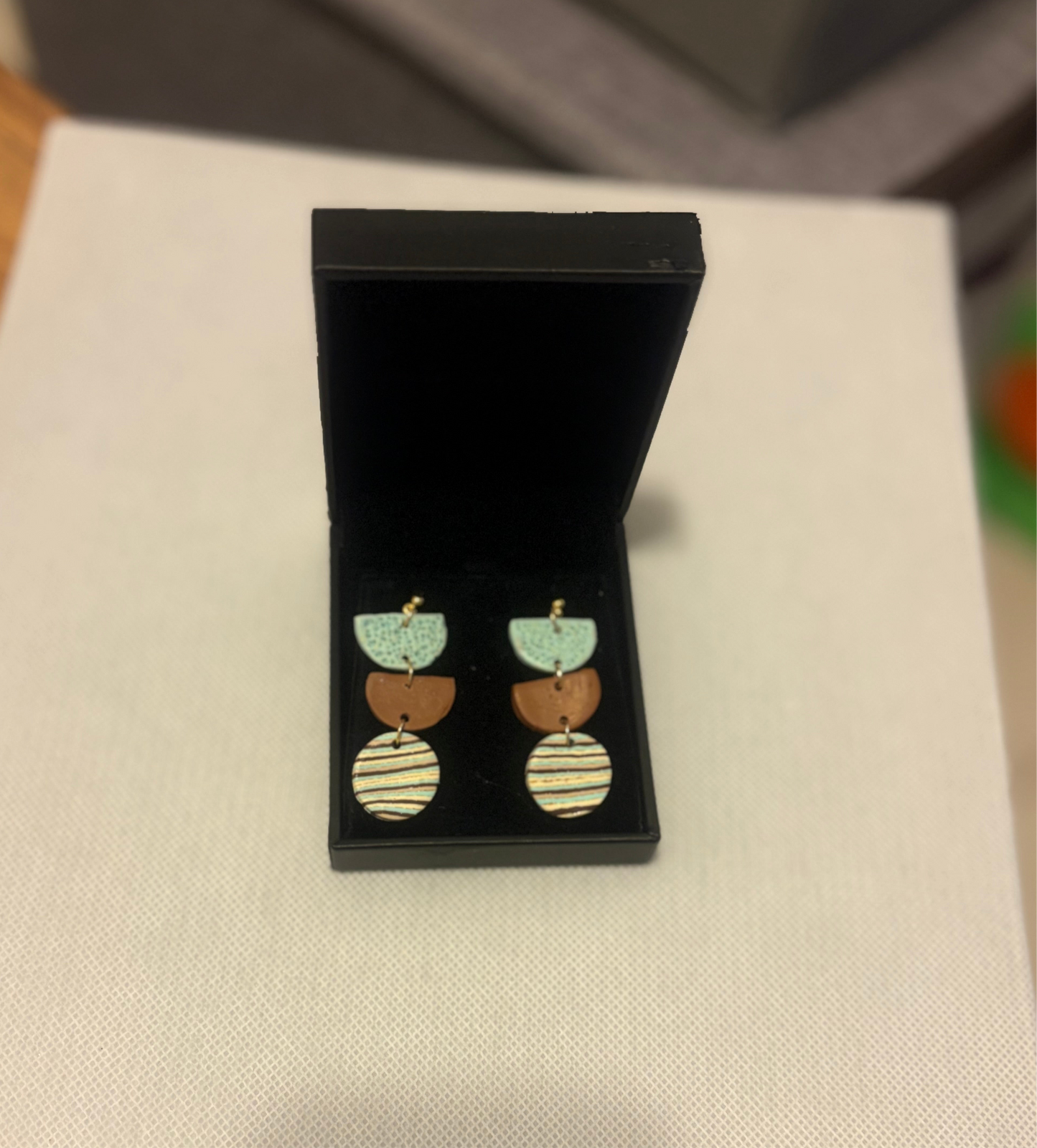 Turquoise and brown half circles dangles