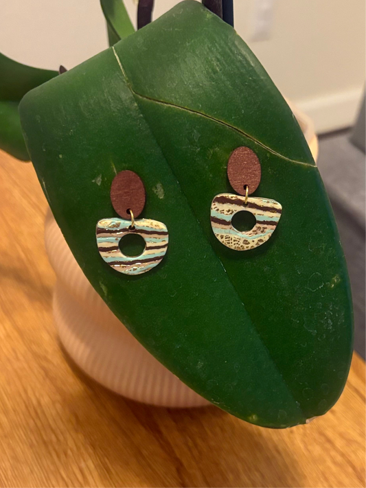 Wooden posts with turquoise striped dangles